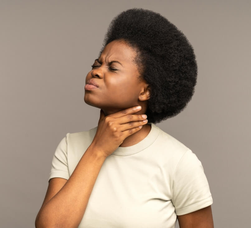 afro-woman-having-sore-throat-tonsillitis-suffer-2022-11-15-04-08-09-utc-1