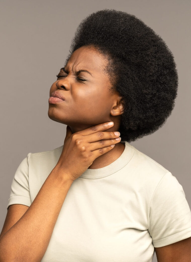 mafro-woman-having-sore-throat-tonsillitis-suffer-2022-11-15-04-08-09-utc-1-768x1051