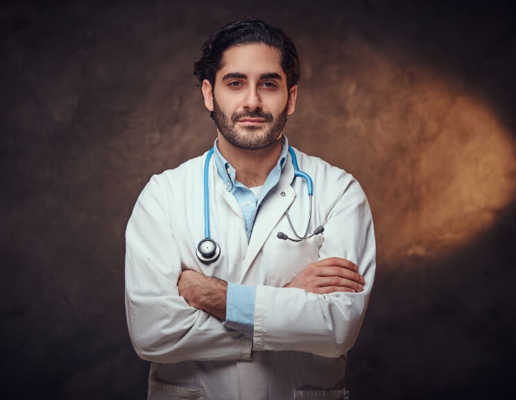portrait-of-smart-handsome-doctor-over-dark-backgr-2021-08-27-23-33-36-utc-1