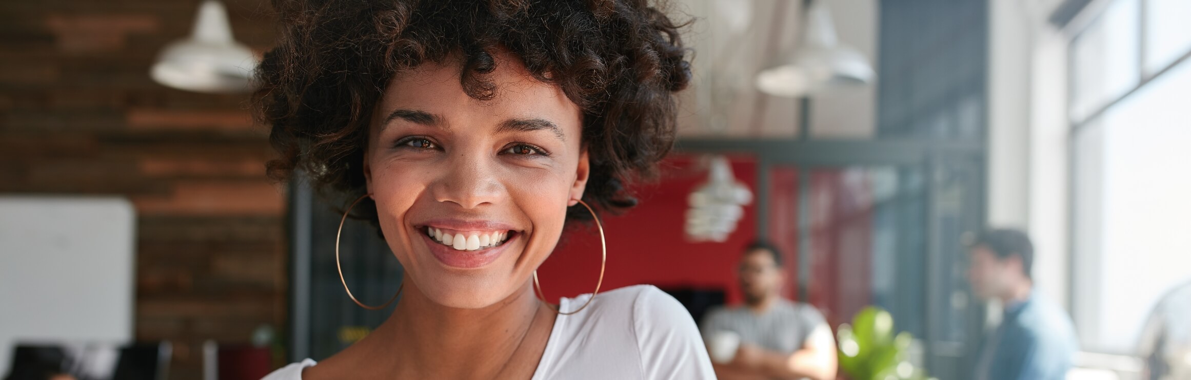 smiling-young-african-businesswoman-with-people-in-2023-11-27-05-01-47-utc-1