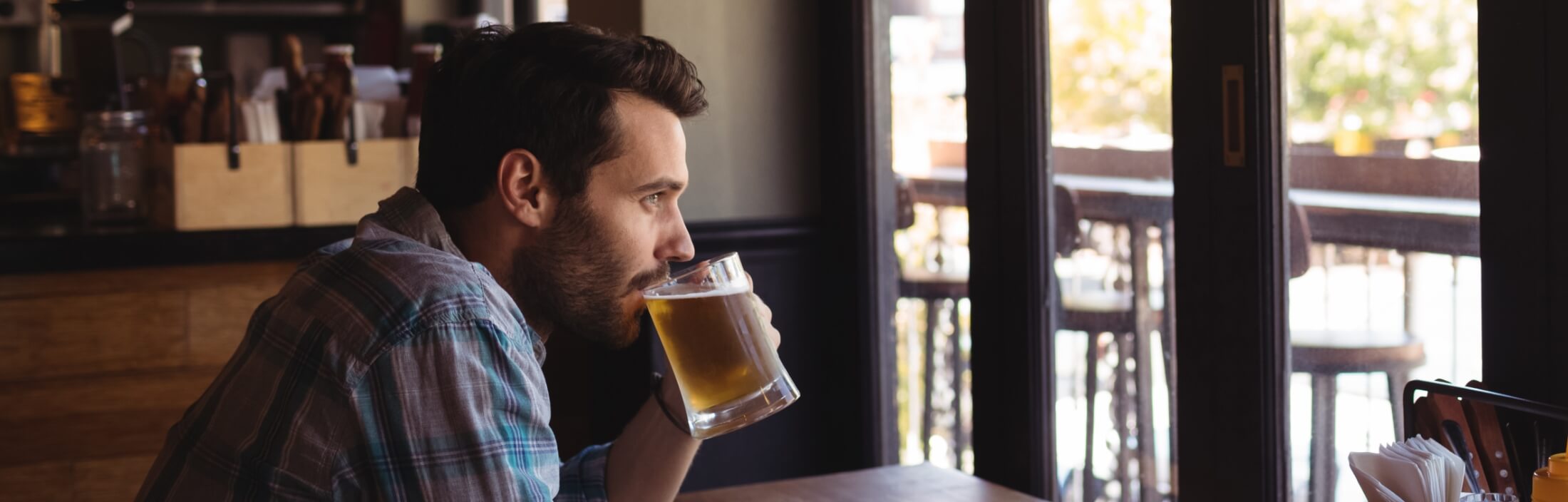 thoughtful-man-having-beer-2021-08-28-16-44-20-utc-1-1
